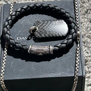 DAVID YURMAN CUSTOM DOG TAG . W/26’ box chain
Dy. RUBBER /SS WAVE bracelet